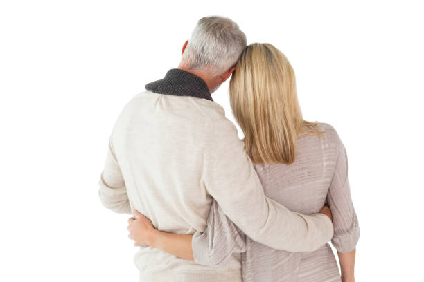 istock Happy couple standing with arms around 816926956