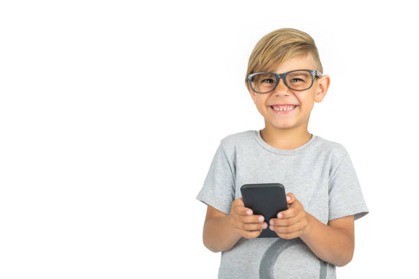 istock Cute child playing on the phone 816949304