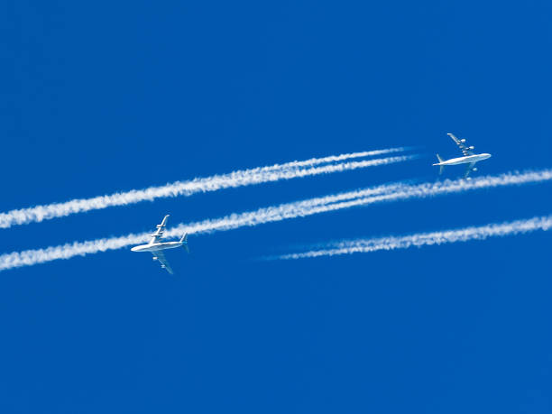 istock Two airplanes on the train intersect in the sky 816968186