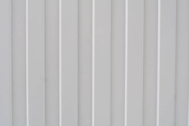 istock metal striped gray fence. 816968534