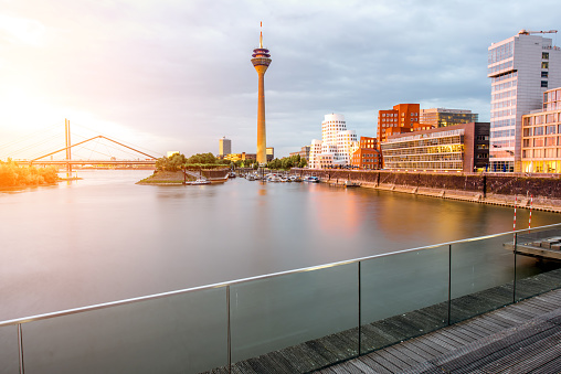 Sunset view on the financial district with modern buildings and television tower in Dusseldorf city, Germany