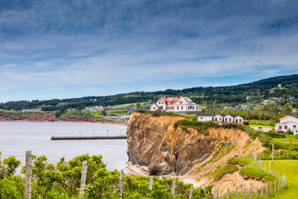 A look at houses in Percé, part of the Gaspé peninsula in Québec. Travel photography. gulf of st lawrence photos stock pictures, royalty-free photos & images
