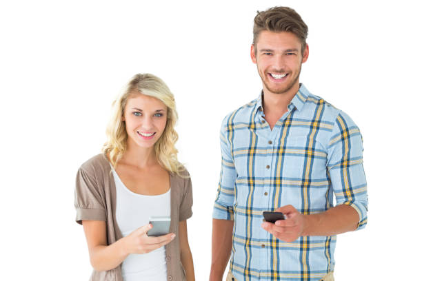 istock Attractive couple using their smartphones 816973850