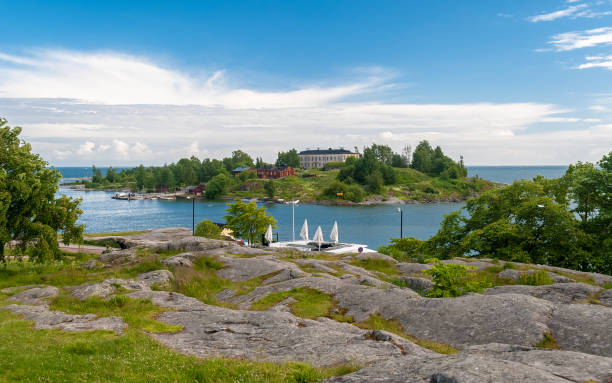 The small island of Harakka seen from the Kaivopuisto park in Helsinki (Finland) stock photo