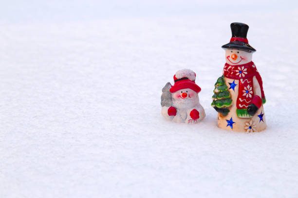 istock Snowman toys outdoors 817006300
