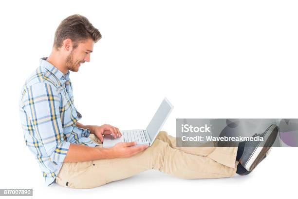 Handsome Young Man Sitting Using Laptop Stock Photo - Download Image Now - 20-24 Years, 20-29 Years, Adult