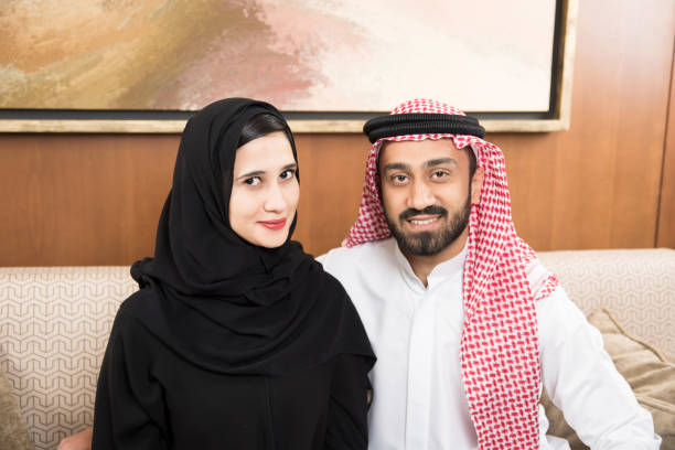 istock Arab couple at home sitting 817013002