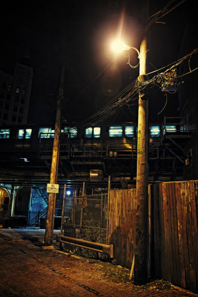 istock Dark Urban Alley at Night with Train 817014014