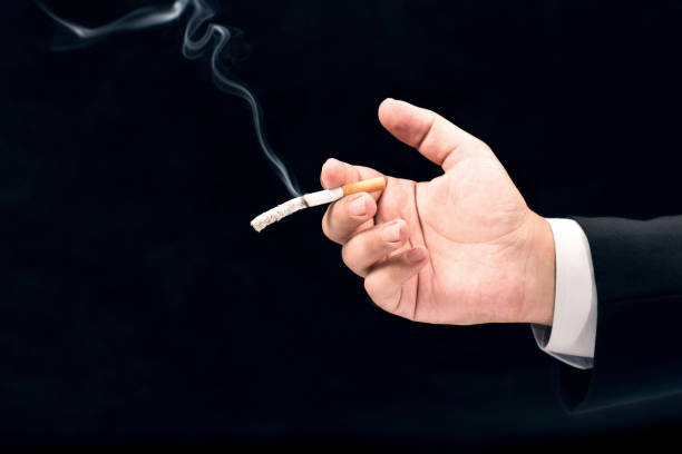 istock Businessman Smoking Cigarette, Concept For Shortening Life Span 817023844