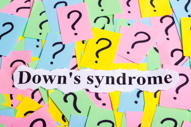 istock Down's syndrome text on colorful sticky notes Against the background of question marks 817026768