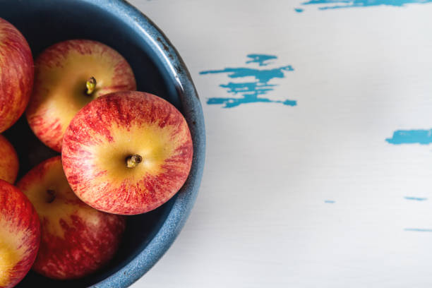 istock Apples from the village. Harvesting. Light white background. 817037010