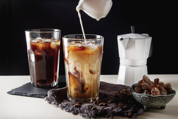 istock Iced coffee with milk. Summer drink. Dark background. 817037108