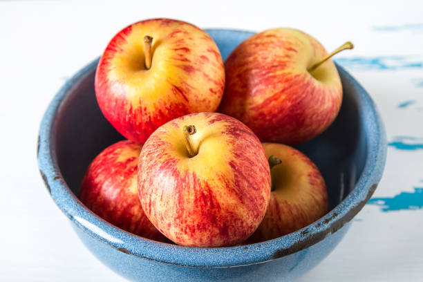 istock Apples from the village. Harvesting. Light white background. 817037170
