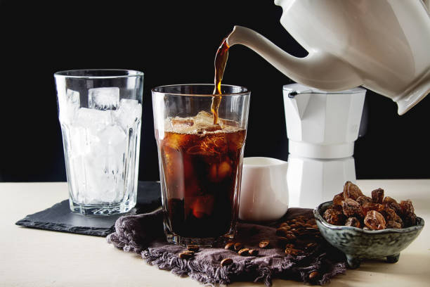 istock Iced coffee with milk. Summer drink. Dark background. 817037182