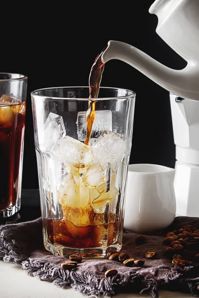 istock Iced coffee with milk. Summer drink. Dark background. 817037228