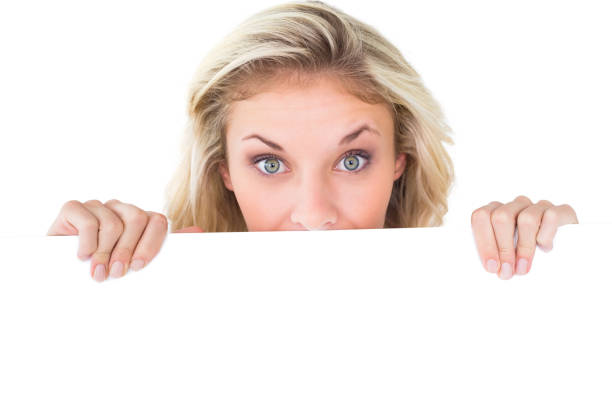 istock Pretty young blonde showing poster 817037538