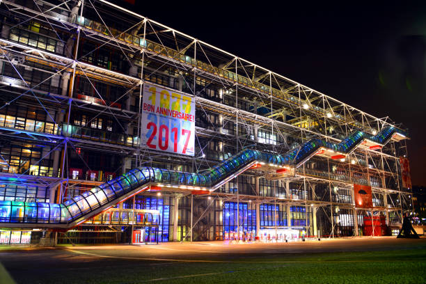 Pompidou Defocused Wide shot at night with long exposure of the iconic art centre Pompidou in Paris France pompidou center stock pictures, royalty-free photos & images