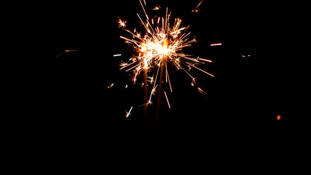 istock Burning Sparklers. Christmas and New Year lights. 817076300