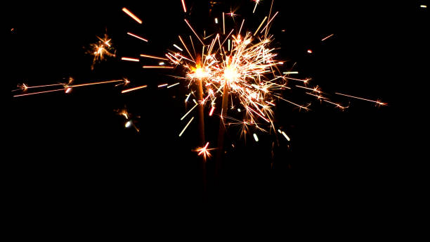 istock Burning Sparklers. Christmas and New Year lights. 817076344