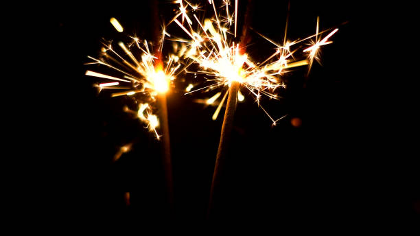 istock Burning Sparklers. Christmas and New Year lights. 817081158