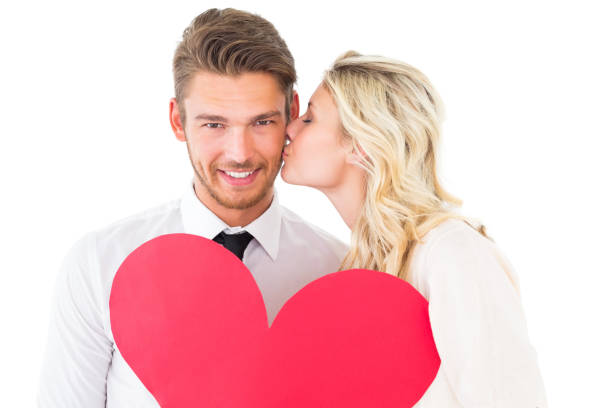 istock Attractive young couple holding red heart 817081180
