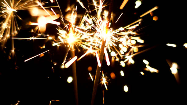 istock Burning Sparklers. Christmas and New Year lights. 817081394