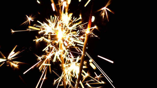 istock Burning Sparklers. Christmas and New Year lights. 817081522