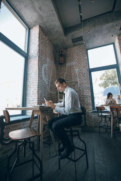 istock businessman in cafe 817104368