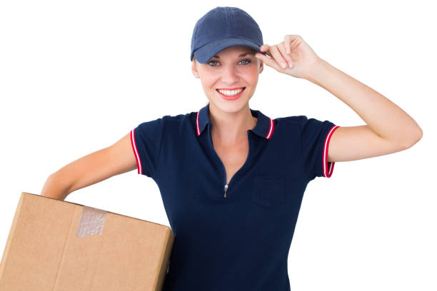 istock Happy delivery woman holding cardboard box 817106296