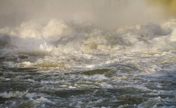 Dangerous river rapids stock photo