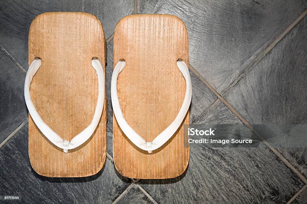 Pair of zori sandals on floor  Geta Sandal Stock Photo