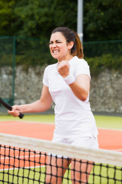 istock Pretty tennis player celebrating a win 817156958