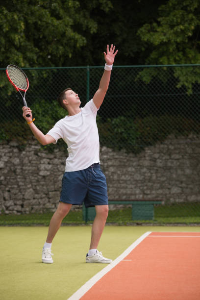 istock Young tennis player about to serve 817166874