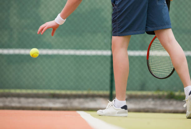 istock Young tennis player about to serve 817167014