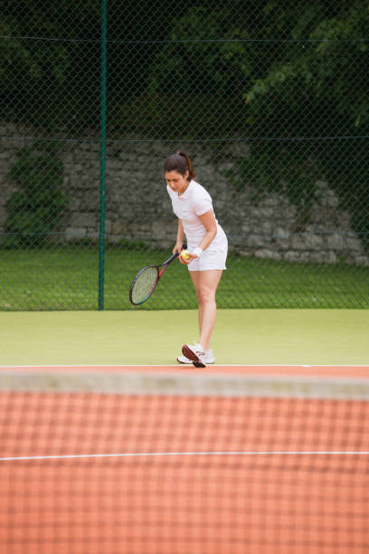 istock Pretty tennis player about to serve 817167020