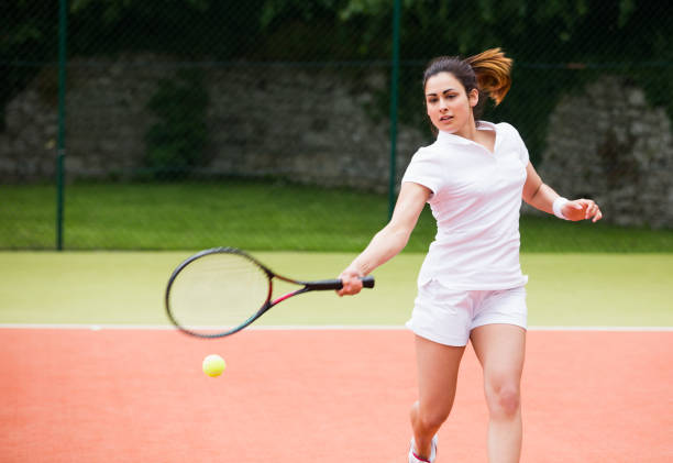 istock Pretty tennis player hitting ball 817167132