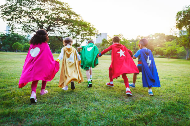 istock Superheroes Cheerful Kids Expressing Positivity Concept 817171836
