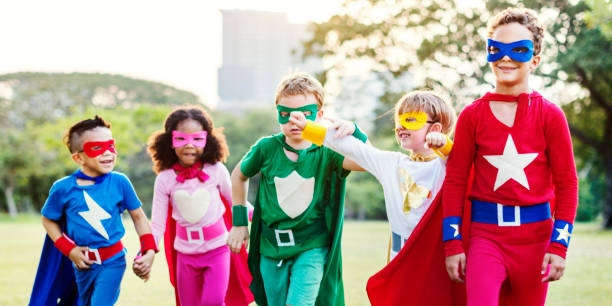 istock Superheroes Cheerful Kids Expressing Positivity Concept 817171940