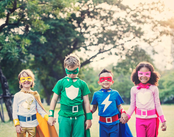 istock Superheroes Cheerful Kids Expressing Positivity Concept 817171970