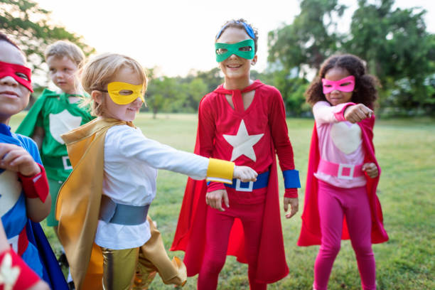 istock Superheroes Cheerful Kids Expressing Positivity Concept 817171990
