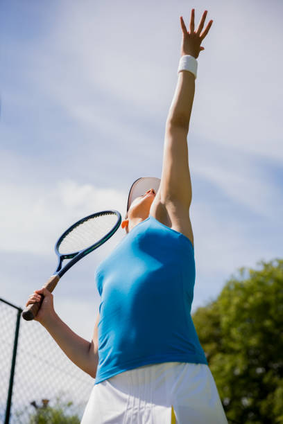 istock Pretty tennis player about to serve 817180204