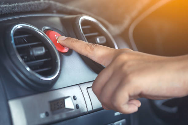 istock Woman finger pressing emergency button on car dashboard 817180228