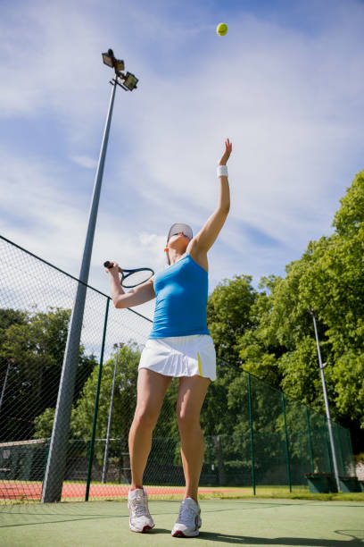 istock Pretty tennis player about to serve 817180240