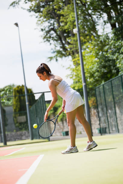 istock Pretty tennis player about to serve 817182484