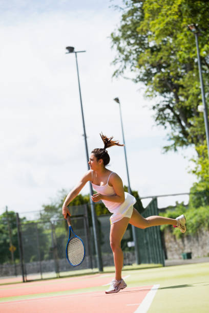istock Pretty tennis player serving the ball 817182552