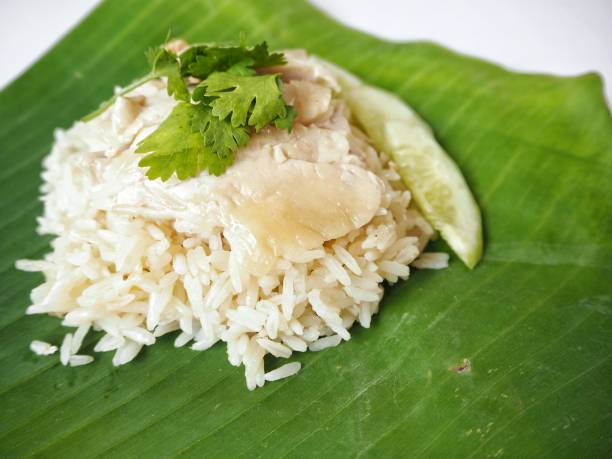 istock Rice steamed with chicken on banana leaf 817182556