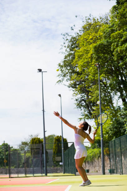 istock Pretty tennis player about to serve 817182798
