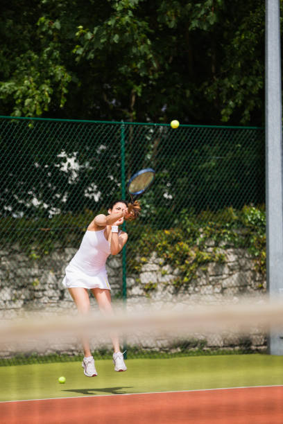 istock Pretty tennis player serving the ball 817183824