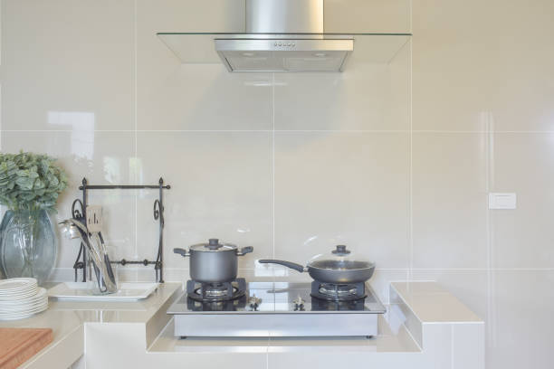 istock stainless pan on gas stove with utensil in modern kitchen 817191278