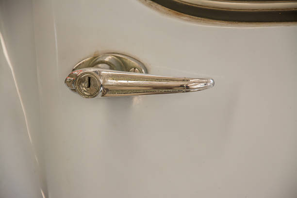 istock Car door handle, vintage car 817193678